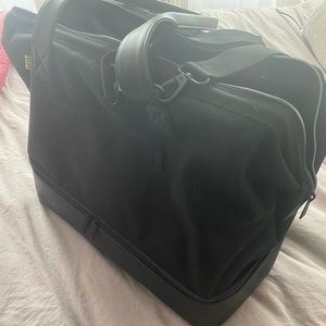 Beis weekender bag with storage compartment
